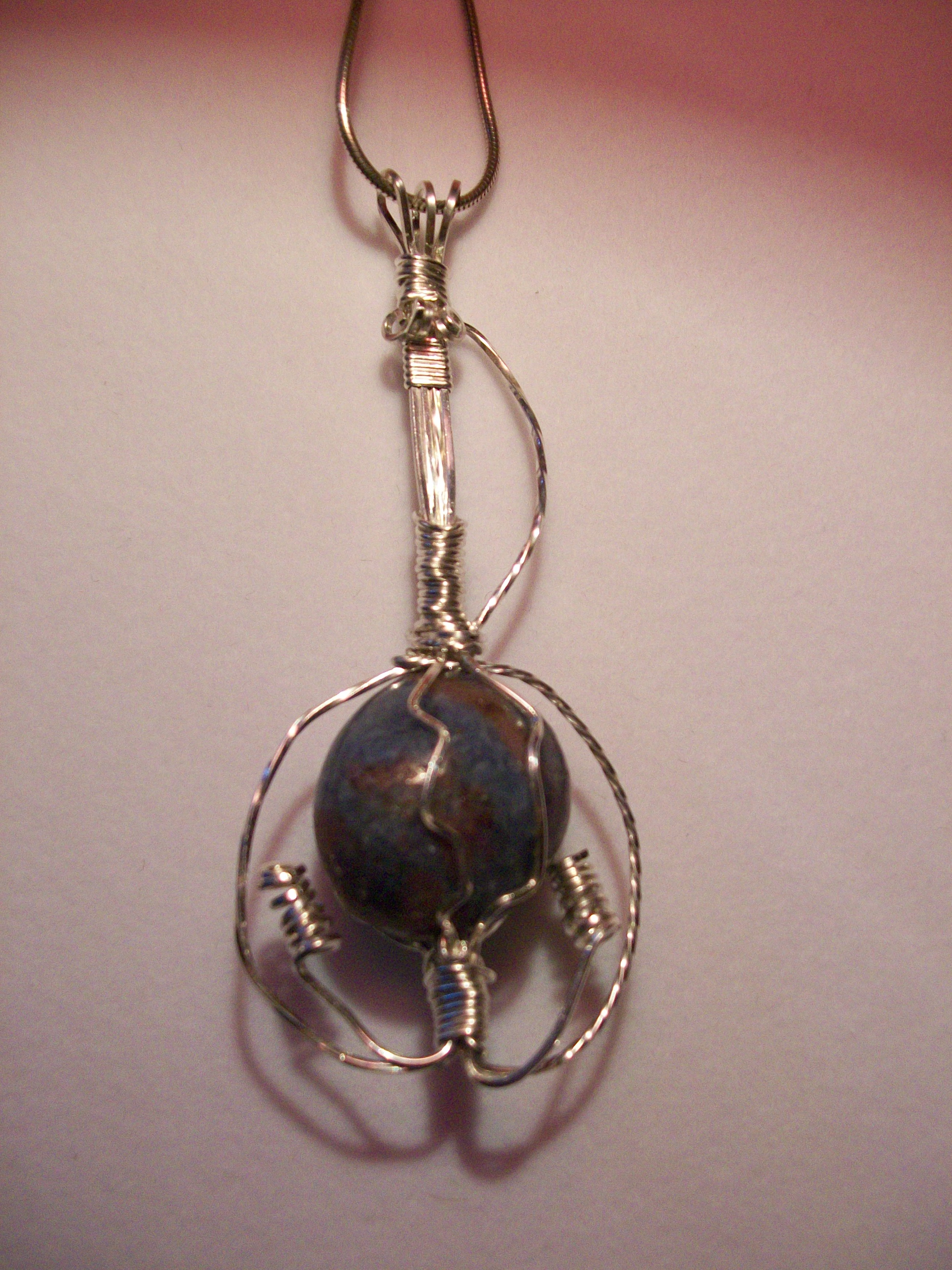 Ruby World pendant back side view